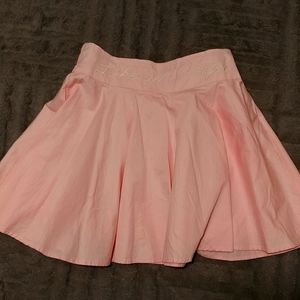 Pink flair cute skirts.